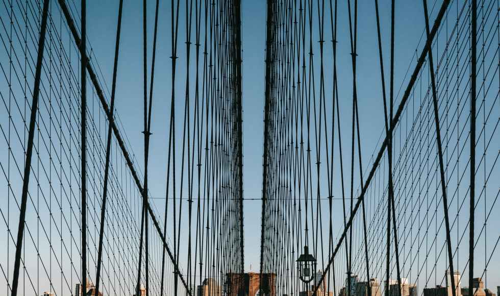 steel cables on suspension bridge in daytime