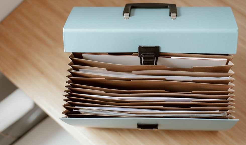 briefcase for documents placed on table
