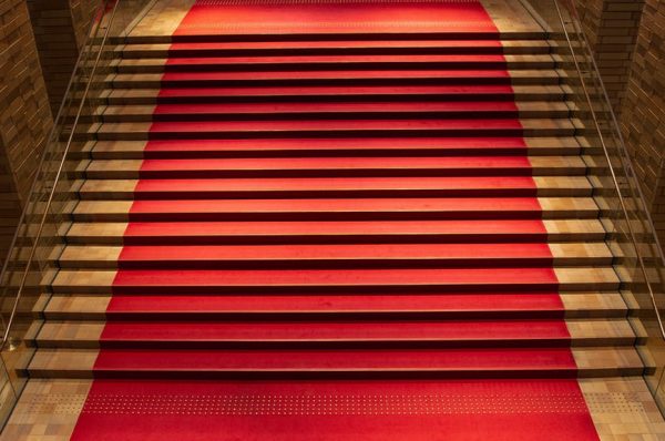 red carpet on stairs in building